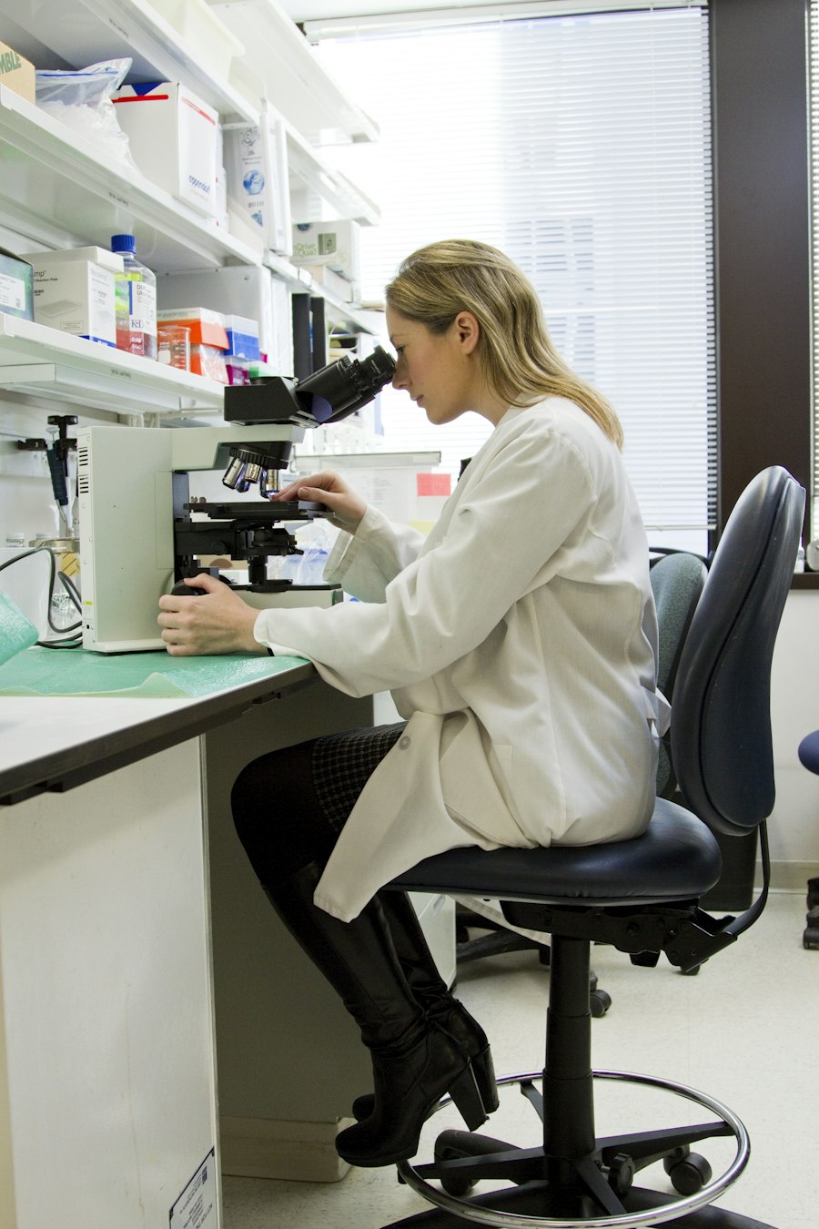 Laboratory scientist at microscope